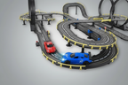 Cars racing through curves